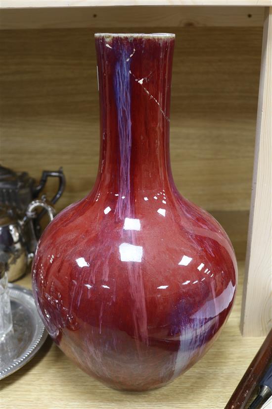 A Chinese sang de boeuf vase height 41cm (a.f.)